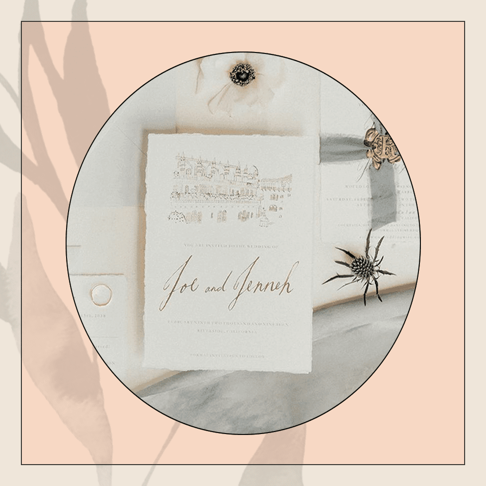 illustrated wedding invitation with gold calligraphy